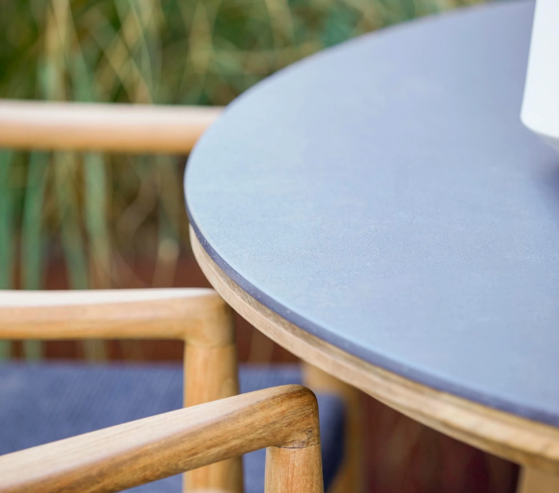 Aspect Teak Dining Table - Round - Cane Line - Outdoor Furniture - Fossil Grey Ceramic - HORNE