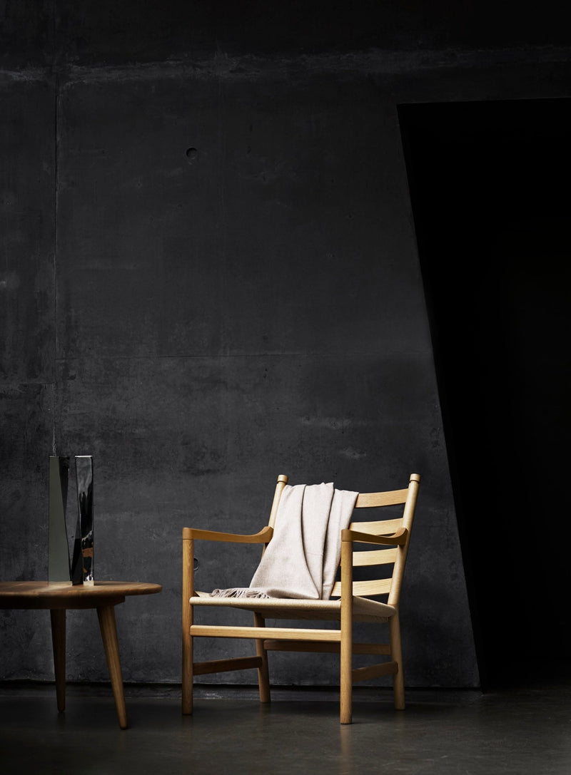 Small, round oak wood coffee table by Carl Hansen & Son