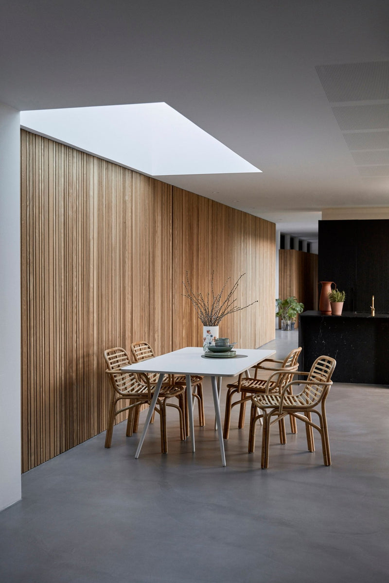 Wooden armchair handcrafted from natural rattan