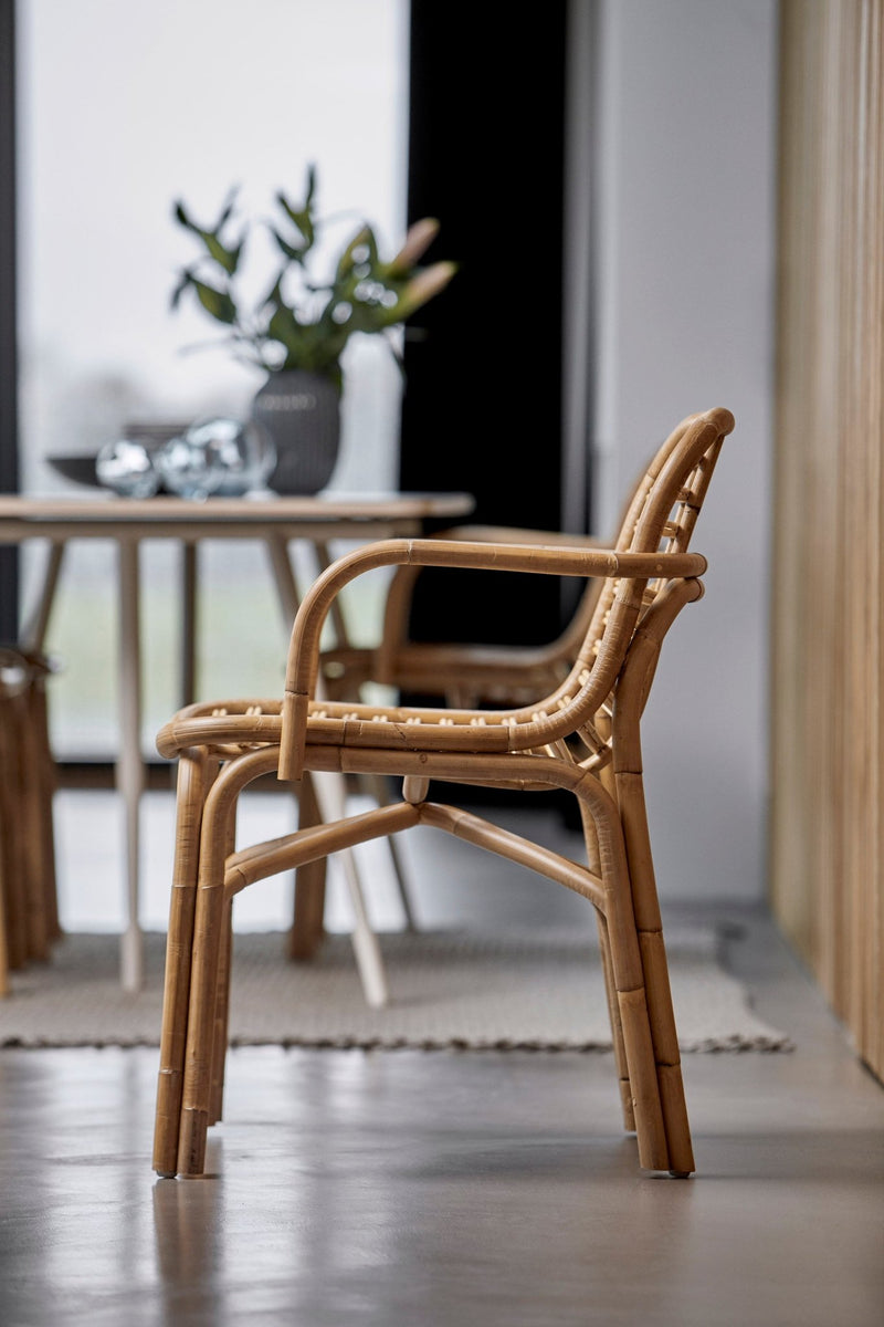 Wooden armchair handcrafted from natural rattan